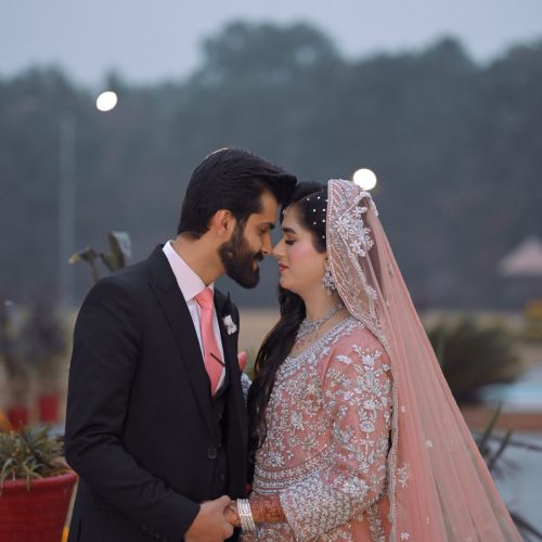Romantic outdoor portrait of a Pakistani bride and groom captured by Shahzaib Studios, wedding photographer in Islamabad, Rawalpindi, and Wah Cantt.